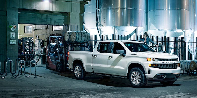 Chevrolet Silverado 1500 driving in workshop